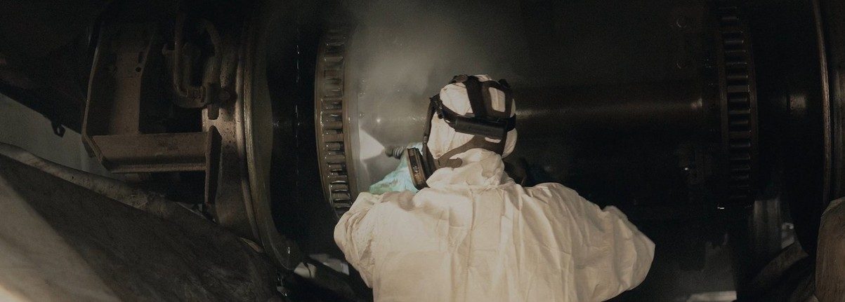 Operative in PPE at work